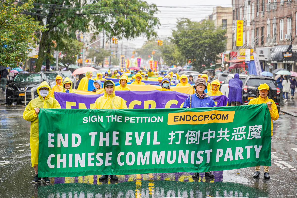 Falun Gong practitioners attend a parade in Brooklyn, New York City, on Oct. 2, 2022, to call an end to the Chinese regime's persecution. (Zhang Jingchu/The Epoch Times).