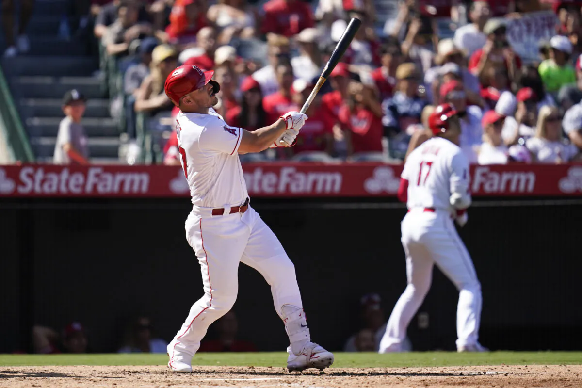 Los Angeles Angels' Mike Trout (27) hits a home run during the fourth inning of a baseball game against the Texas Rangers in Anaheim, Calif., on Oct. 2, 2022. (Ashley Landis/AP Photo)