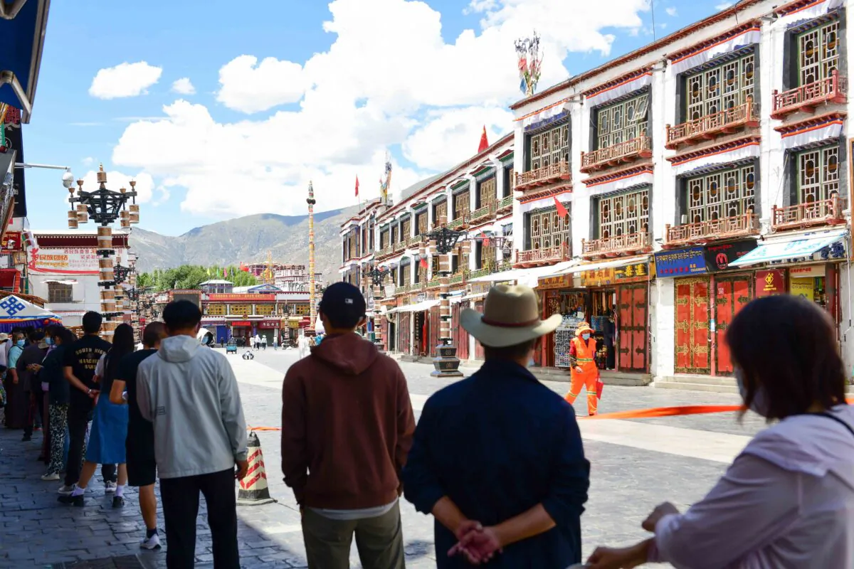 People queue to undergo nucleic acid testing for COVID-19 in Lhasa, Tibet on Aug. 9, 2022. (-/CNS/AFP via Getty Images)