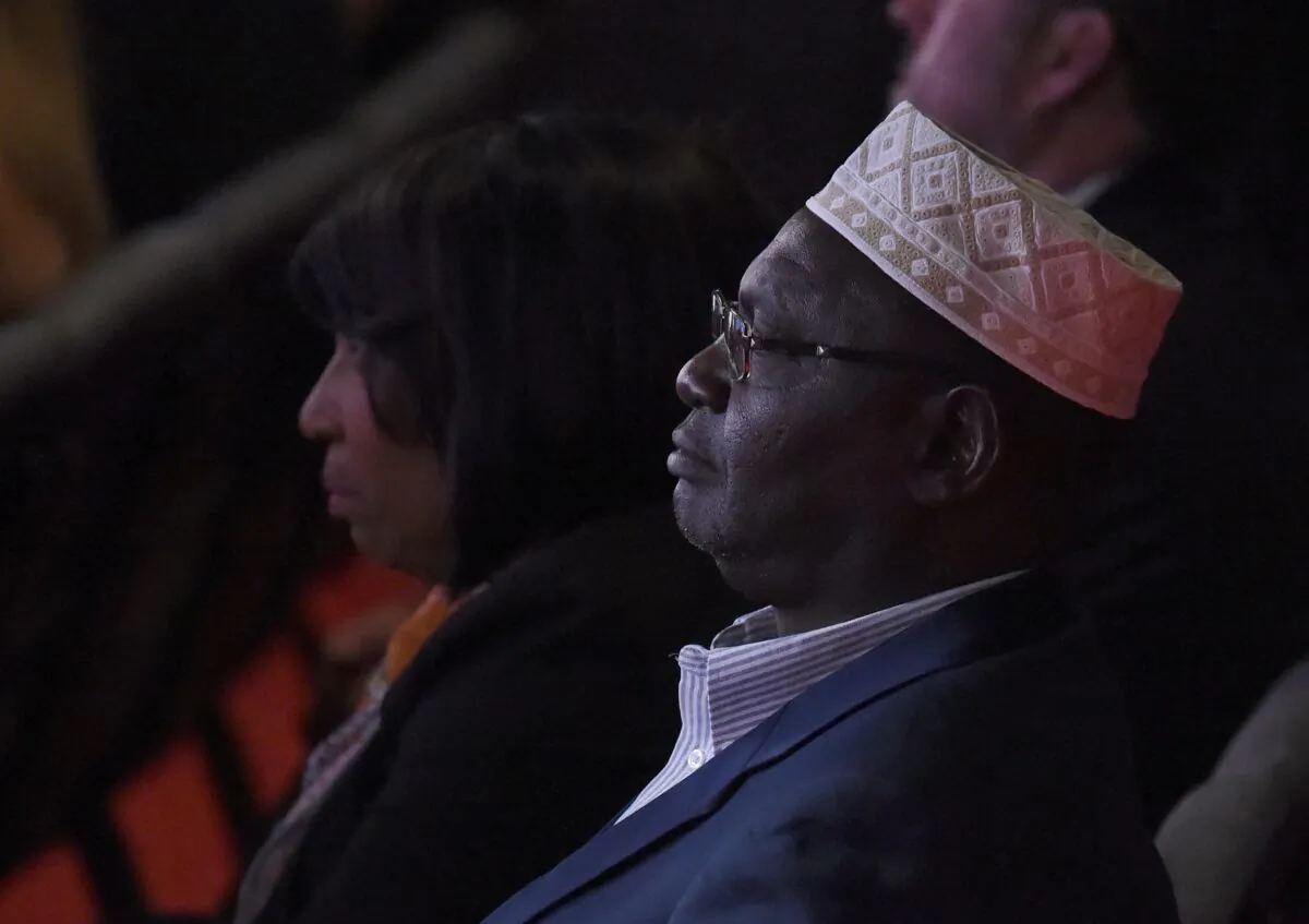 The half brother of former U.S. President Barack Obama, Malik Obama, watches the final presidential debate at the Thomas & Mack Center on the campus of the University of Las Vegas in Las Vegas, Nevada on Oct. 19, 2016. (Robyn Beck/AFP via Getty Images)
