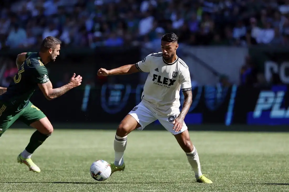 Denis Bouanga of the Los Angeles FC dribbles against a defender of the Portland Timbers at Providence Park in Portland, Ore., on Oct. 2, 2022. (Field Level Media)
