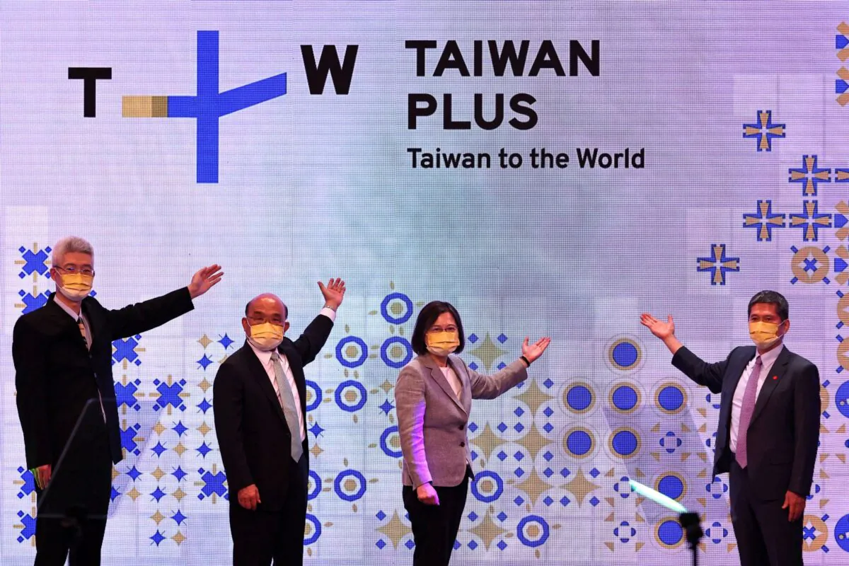 Taiwanese President Tsai Ing-wen (3rd L) attends the television operations launch event of TaiwanPlus, a government-backed English language news channel, in Taipei, Taiwan, on Oct. 3, 2022. (Ann Wang/Reuters)