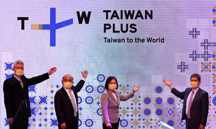 Taiwanese President Tsai Ing-wen (3rd L) attends the television operations launch event of TaiwanPlus, a government-backed English language news channel, in Taipei, Taiwan, on Oct. 3, 2022. (Ann Wang/Reuters)