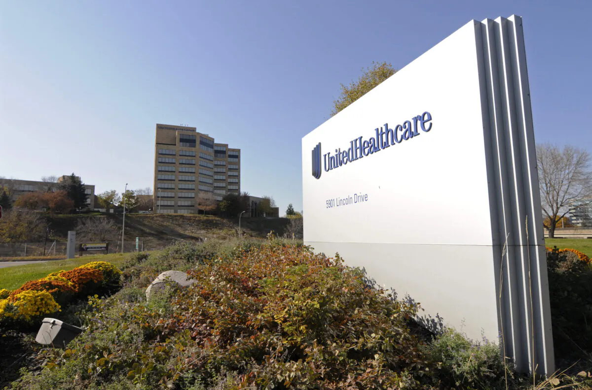 A sign stands on UnitedHealth Group Inc.'s campus in Minnetonka, Minn., on Oct. 16, 2012. (Jim Mone/AP Photo)