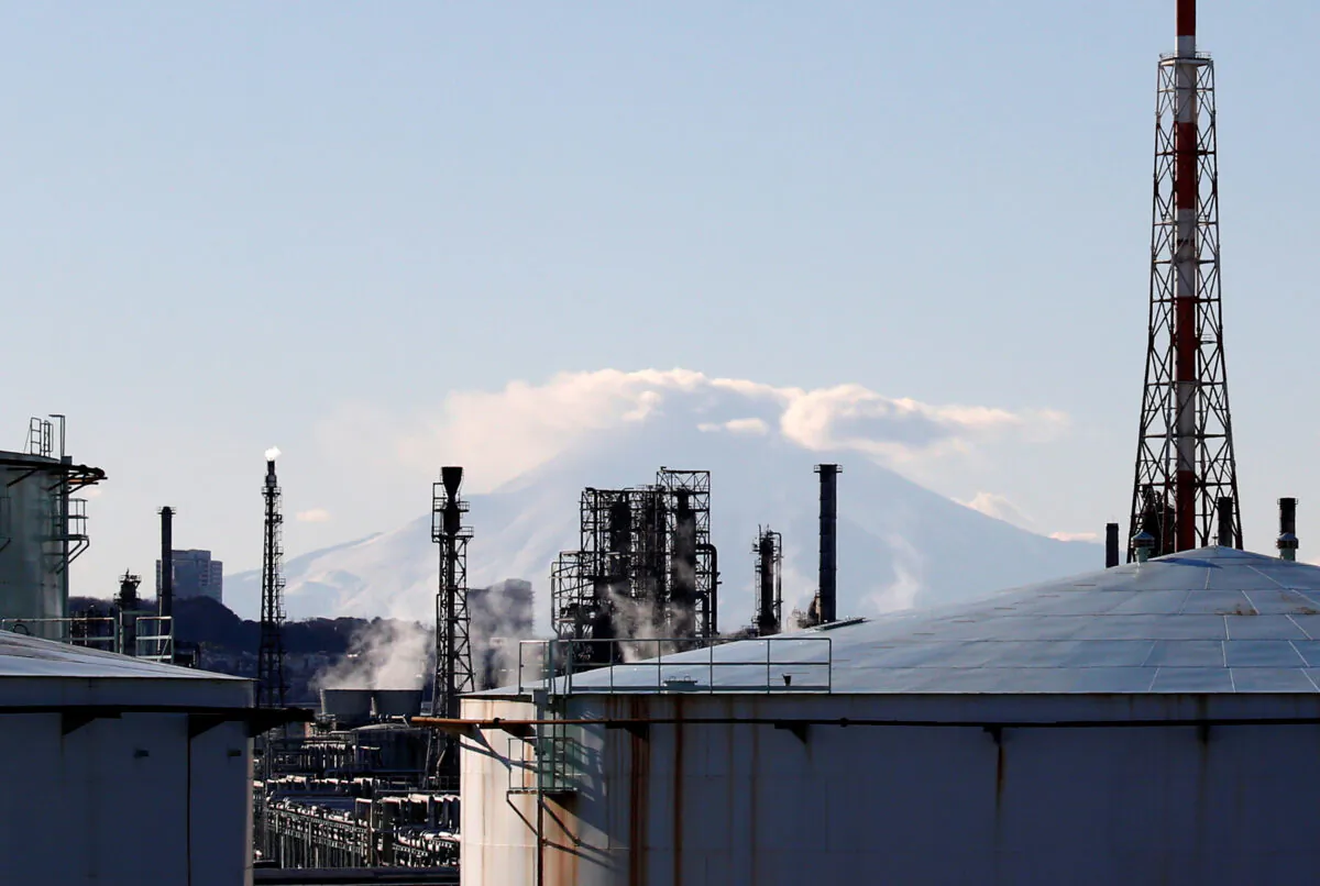 A factory area in front of Mount Fuji in Yokohama, Japan, on Jan. 16, 2017. (Kim Kyung-Hoon/Reuters)