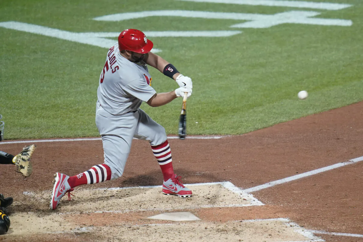 St. Louis Cardinals' Albert Pujols hits career home run No. 703 during the fifth inning of a baseball game against the Pittsburgh Pirates in Pittsburgh, on Oct. 3, 2022. (Keith Srakocic/AP Photo)