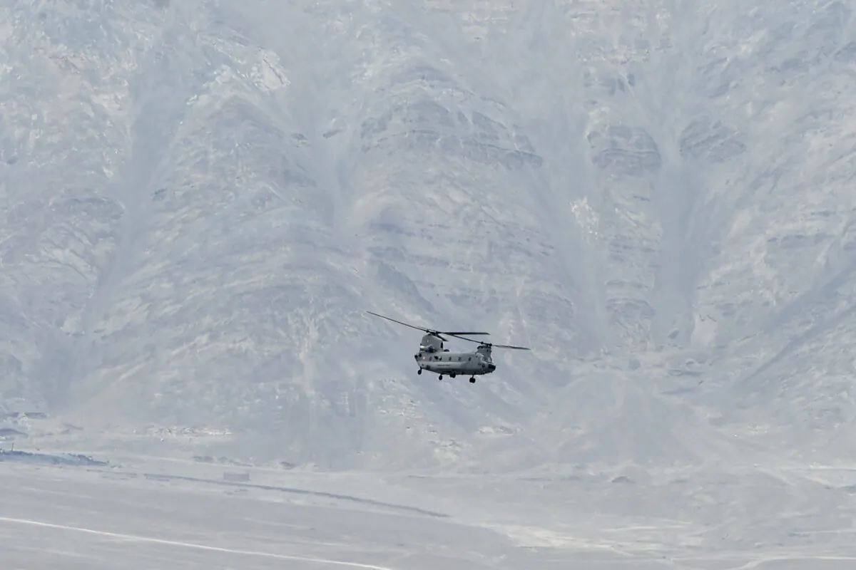 An Indian Air Force's Chinook helicopter flies over a mountain range near Leh, the joint capital of the union territory of Ladakh, on June 24, 2020. (Tauseef Mustafa/AFP via Getty Images)