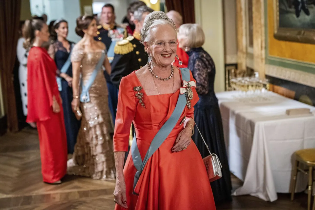 Queen Margrethe II of Denmark greets guests during a break at the Danish Royal Theatre to mark the 50th anniversary of Danish Queen Margrethe II's accession to the throne in Copenhagen, Denmark, on Sept. 10, 2022. (Ida Marie Odgaard/Ritzau Scanpix via AP)