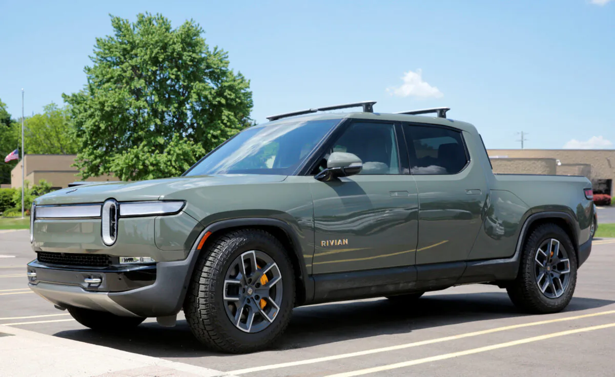 A Rivian R1T electric truck outside Munro & Associates headquarters in Auburn Hills, Mich., on June 3, 2022. (Rebecca Cook/Reuters)