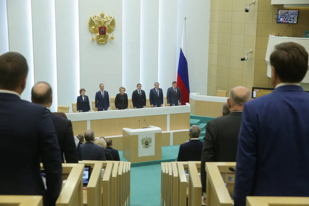 Members of the Russia's Federation Council, the upper house of parliament, attend a session to ratify legislation on annexing Ukraine's Donetsk, Kherson, Luhansk, and Zaporizhzhia regions into Russia, in Moscow on Oct. 4, 2022. (Russian Federation Council/Handout via Reuters)