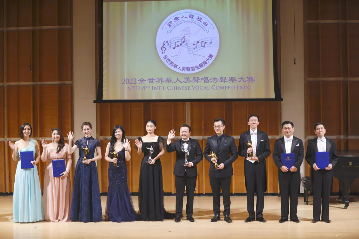 Winners of the NTD TV 8th International Chinese Vocal Competition held on Oct. 2 at the Merkin Hall of Kaufman Music Center, New York. From left to right: Jeannette Lee from Hong Kong (Honorable Award), Pauline Hsu from Taiwan (Honorable Award), Rachael Bastick from New York (Bronze Award), Hsinju Lo from Taiwan (Bronze Award), Jingjing Xu from Canada (Silver Award), The Tung Lam from Vietnam (Silver Award), Wade Park from New York (Bronze Award), Richard Li from New York (Bronze Award), Peter Huang from New York (Honorable Award), Tony Tang from New York (Honorable Award). (Zhenli Lian/Epoch Times)