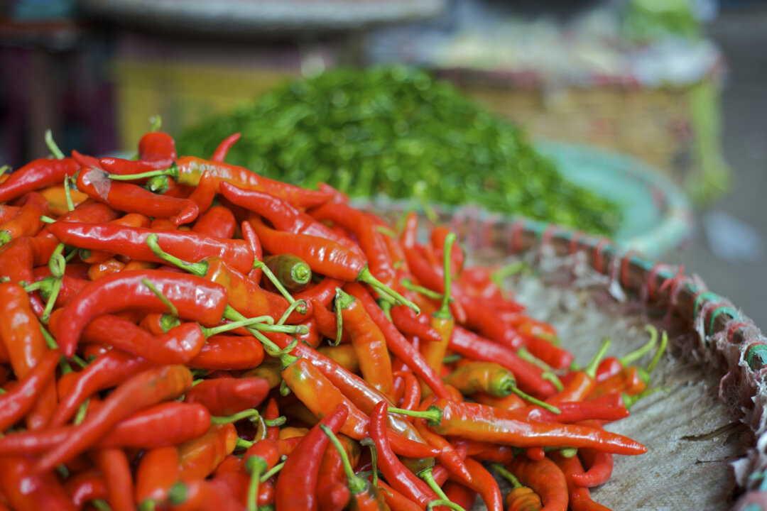 Deep, vibrant color and smooth, shiny skin indicates a fresh chili pepper. (Dreamstime/TNS)