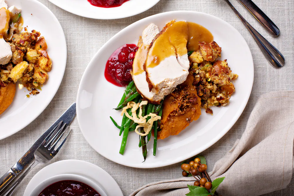 One way to cut down on fat this Thanksgiving is to simply choose smaller portion sizes. Elena Veselova/Shutterstock.com