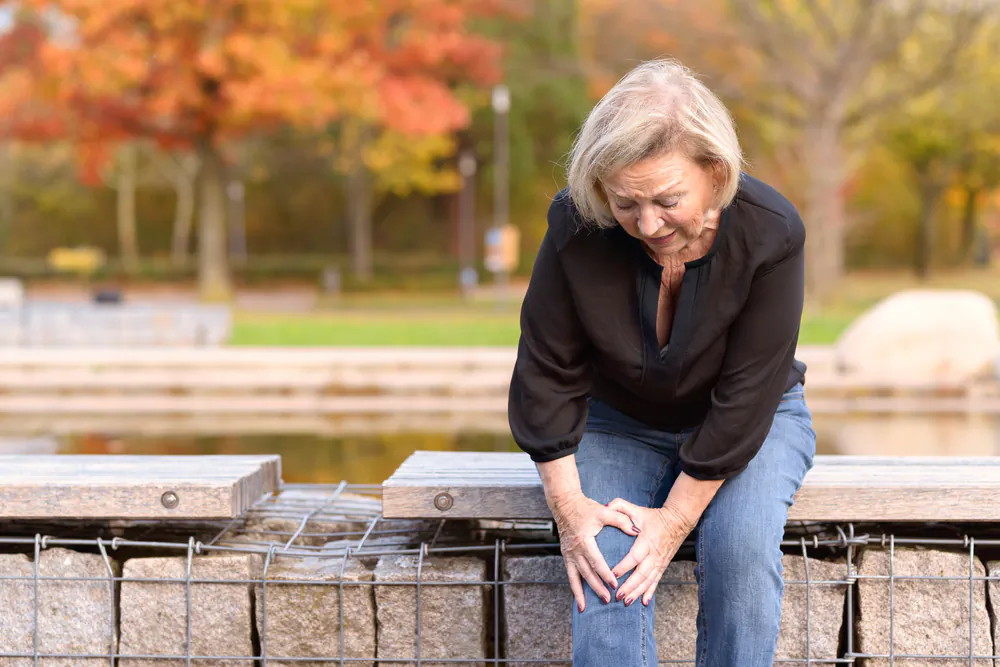 Joint pain may be more common in older people but regular exercise can help minimize the risk of knee arthritis. (michaelheim/Shutterstock)