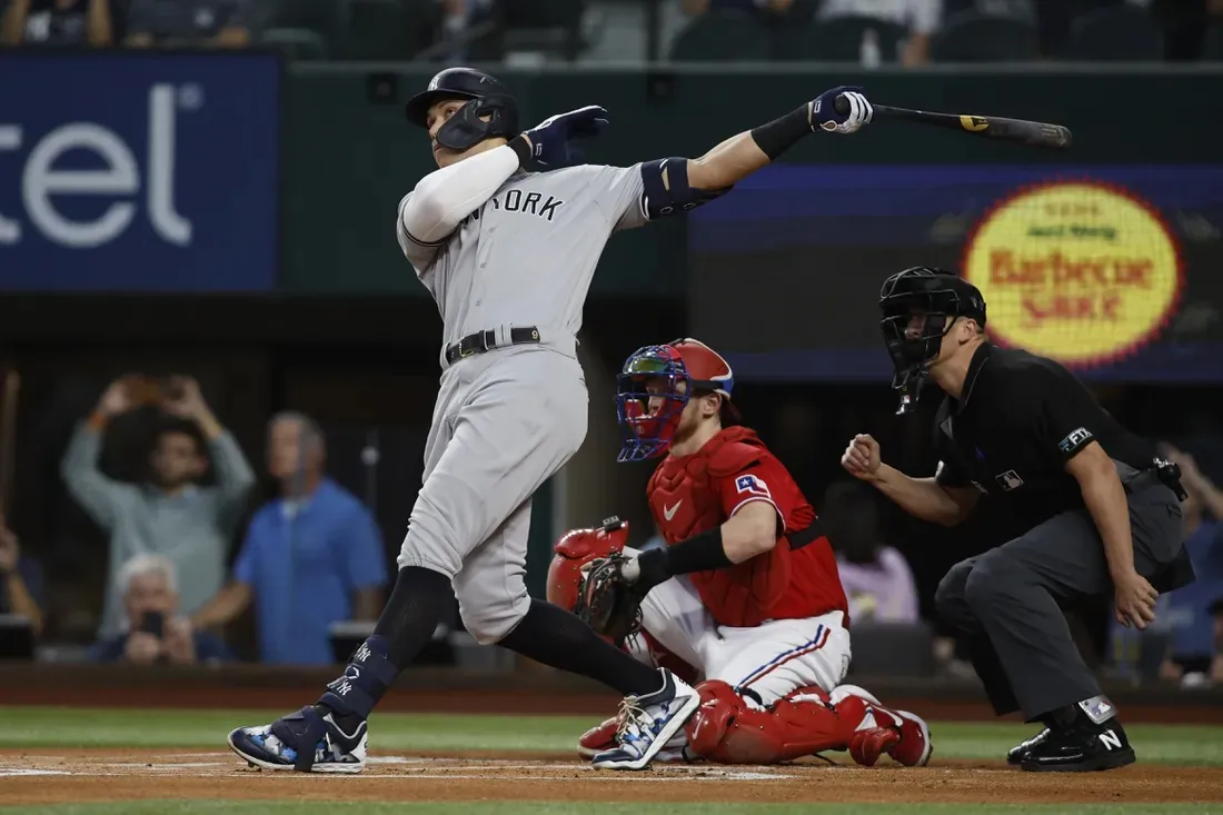 New York Yankees right fielder Aaron Judge (99) hits home run number sixty-two to break the American League home run record in the first inning against the Texas Rangers at Globe Life Field in Arlington, Texas, on Oct. 4, 2022. (Tim Heitman-USA TODAY Sports via Field Level Media)