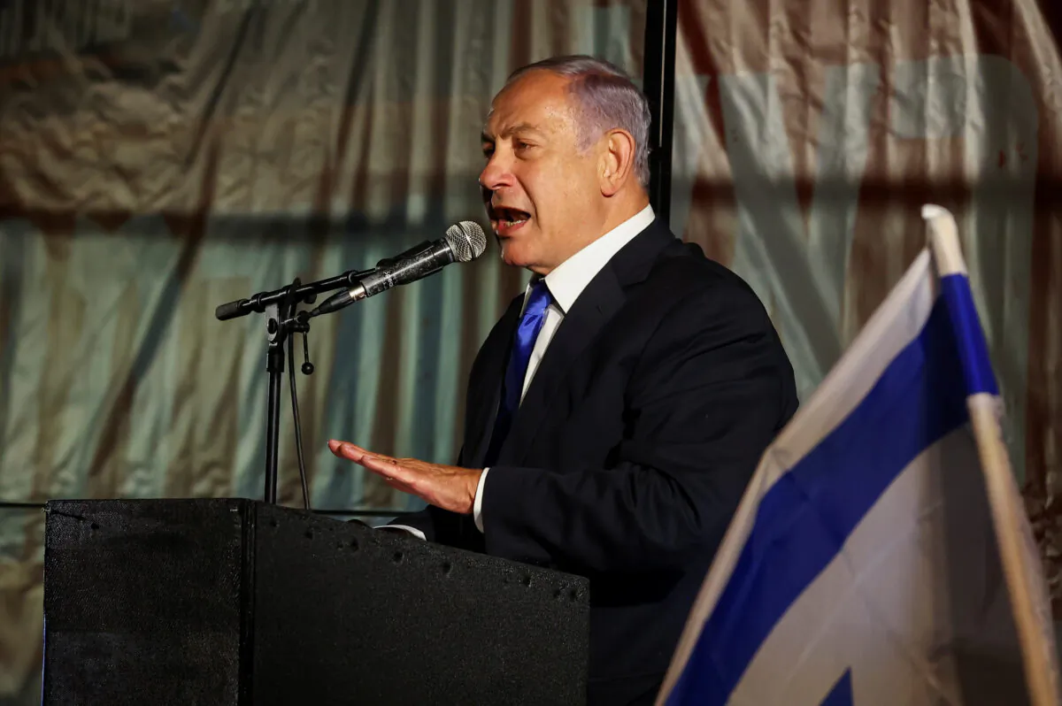 Then-former Israeli Prime Minister Benjamin Netanyahu speaks during a rally in Jerusalem on April 6, 2022. (Ronen Zvulun/Reuters)