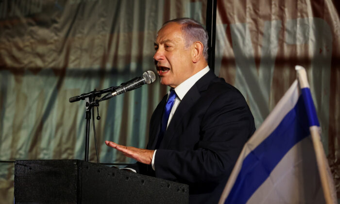 Then-former Israeli Prime Minister Benjamin Netanyahu speaks during a rally in Jerusalem on April 6, 2022. (Ronen Zvulun/Reuters)