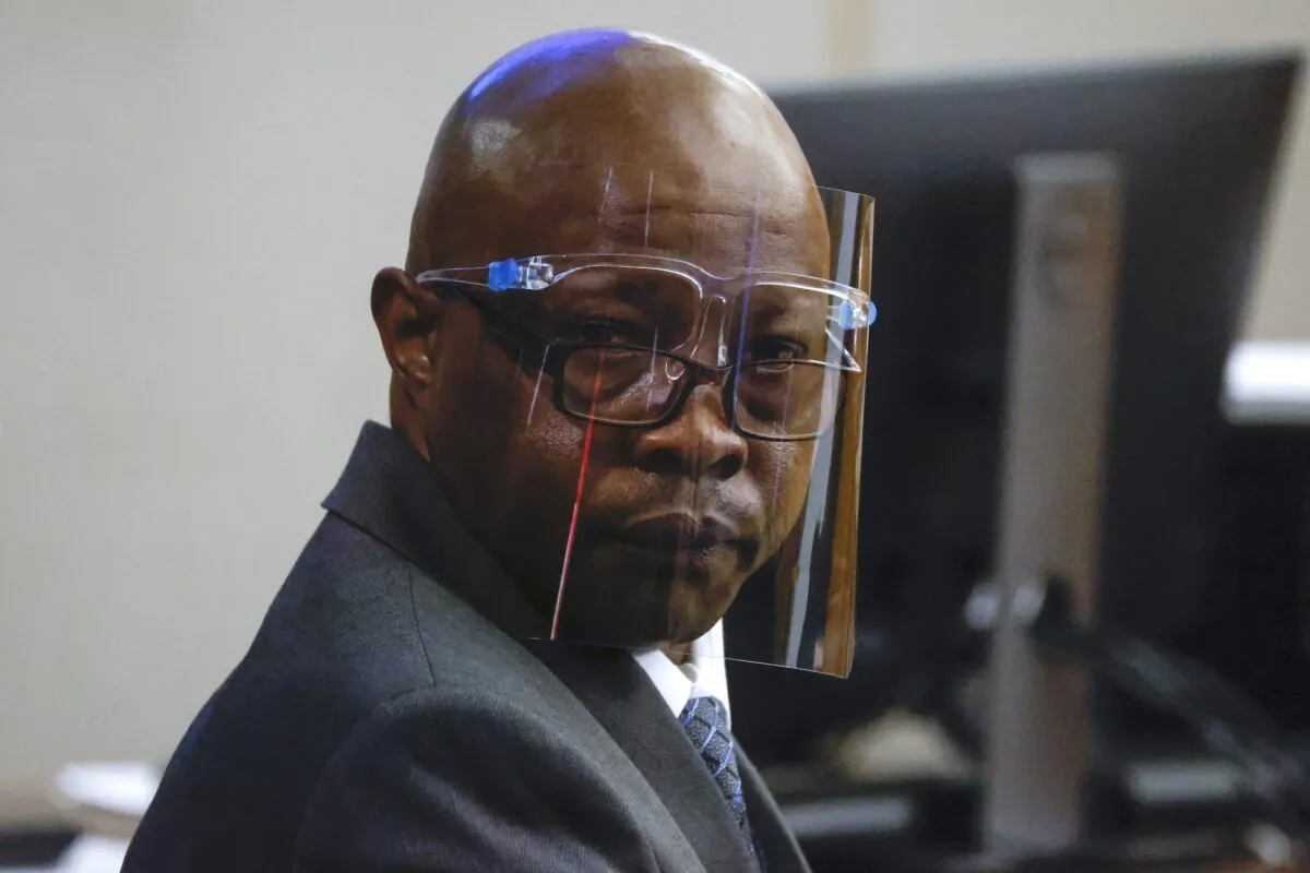 Accused serial killer Billy Chemirmir looks back ahead of his third trial at Frank Crowley Courts Building in Dallas on Oct. 3, 2022. (Shafkat Anowar/The Dallas Morning News via AP)