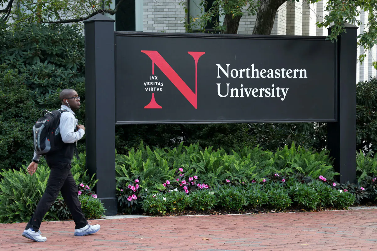 A student walks through Krentzman Quadrangle on Northeastern University Campus in Boston, Mass., on Sept. 14, 2022. (Maddie Meyer/Getty Images)