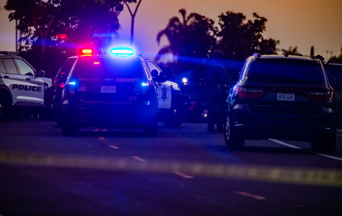 Police monitor a crime scene in a file photo. (John Fredricks/The Epoch Times)