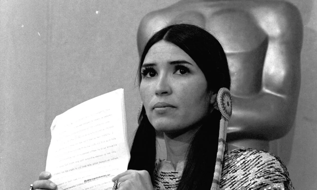 Sacheen Littlefeather, a Native American activist, tells the audience at the Academy Awards ceremony in Los Angeles, on March 27, 1973, that Marlon Brando was declining to accept his Oscar as best actor for his role in "The Godfather." (AP Photo)