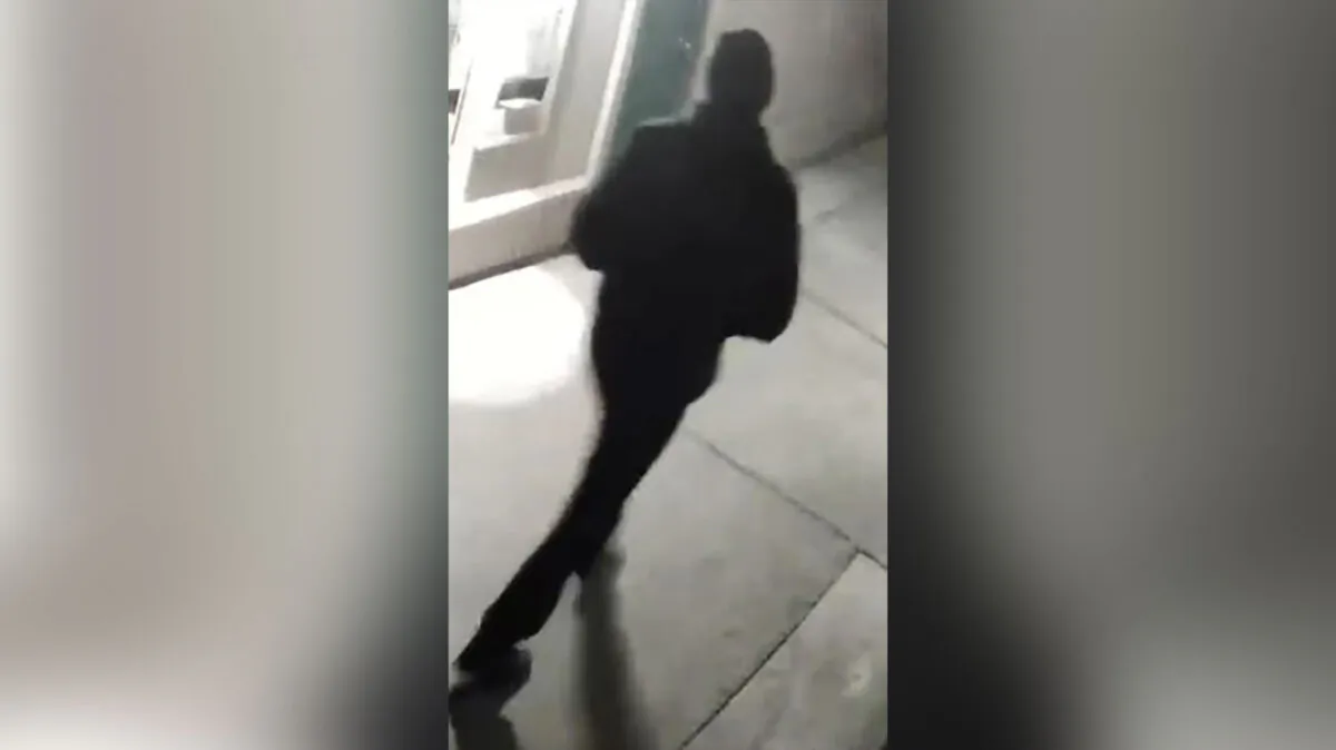A person is shown from behind, in Stockton, Calif., in an undated surveillance image. (Stockton Police Department via AP)