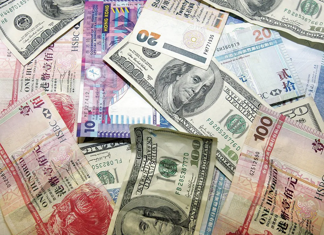 Hong Kong's economic cycle increasingly resembles that of mainland China, but its financial sector continues to follow the pace of the Fed’s interest rate hikes, placing it in a challenging position. (AFP)