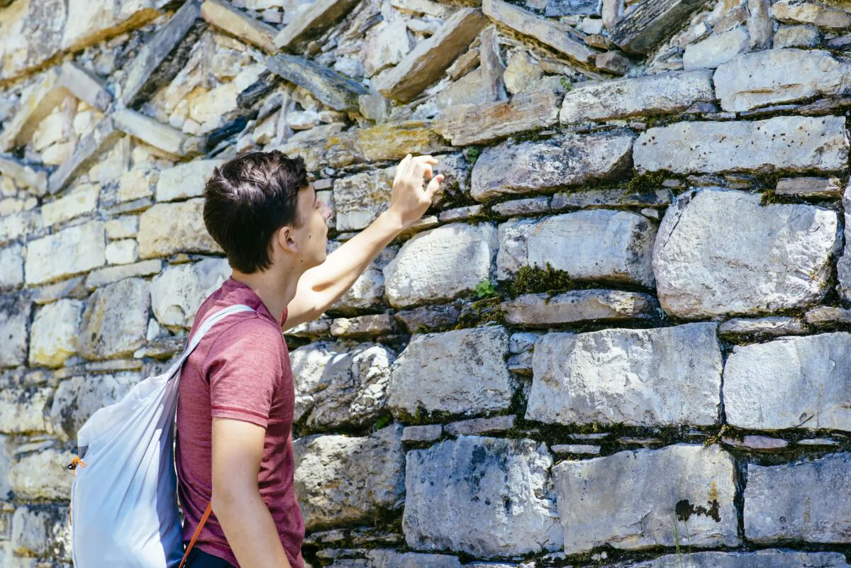 A young tourist in the pre-inca walled city Kuelap, Peru. (Joerg Steber/Shutterstock)