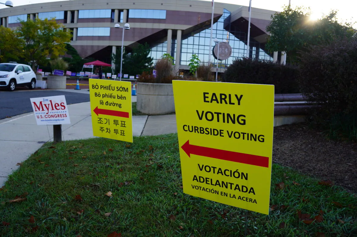 An early voting sign outside the Fairfax County Government Center in Fairfax, Va., on Oct. 7, 2022. (Terri Wu/The Epoch Times)