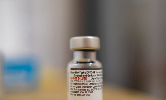 A vial of the Pfizer-BioNTech coronavirus disease (COVID-19) booster vaccine targeting BA.4 and BA.5 Omicron sub-variants is pictured at Skippack Pharmacy in Schwenksville, Pa., on Sept. 8, 2022.  (Reuters/Hannah Beier)