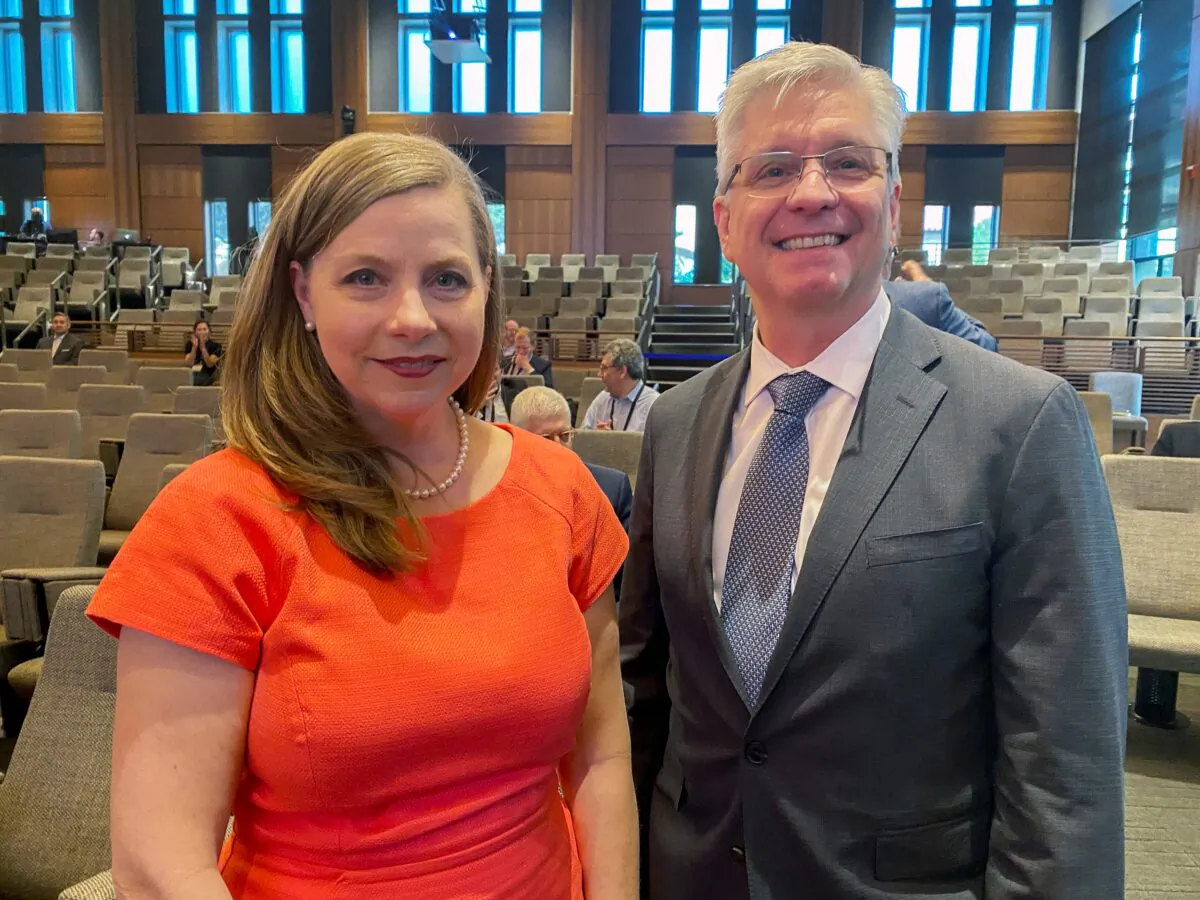 Federal Reserve governors Michelle Bowman and Christopher Waller (R) pose for a photo, during a break at a conference on monetary policy at Stanford University's Hoover Institution, in Palo Alto, Calif., on May 6, 2022. (Ann Saphir/Reuters)