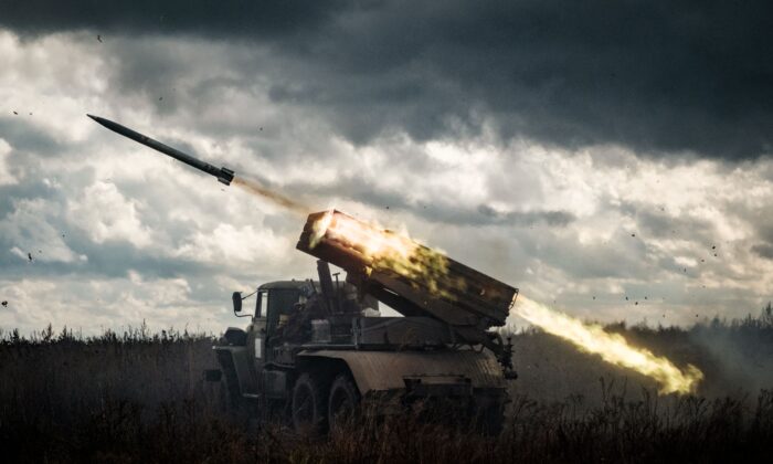 A BM-21 'Grad' multiple rocket launcher fires at Russian positions in Kharkiv region on Oct. 4, 2022. (Yasuyoshi Chiba/AFP via Getty Images)