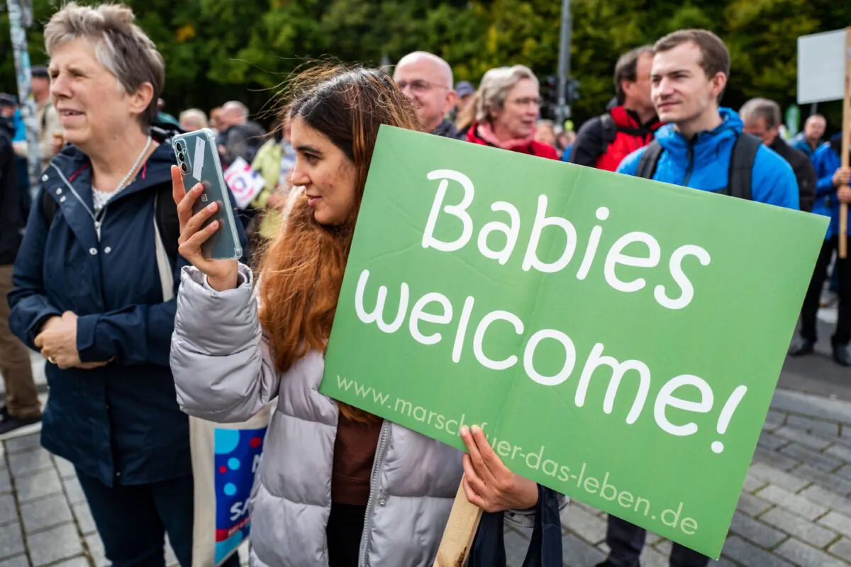 A protester displays a placard during the annual anti-abortion "March for Life" demonstration in Berlin on Sept. 17, 2022. (John Macdougall/AFP via Getty Images)