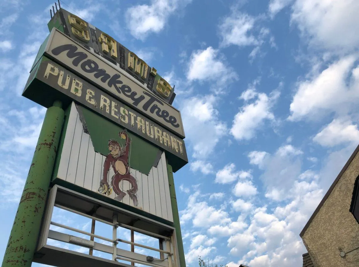The Monkey Tree Pub sign is shown outside of the establishment in Yellowknife on Aug. 4, 2022. (The Canadian Press/Emily Blake)