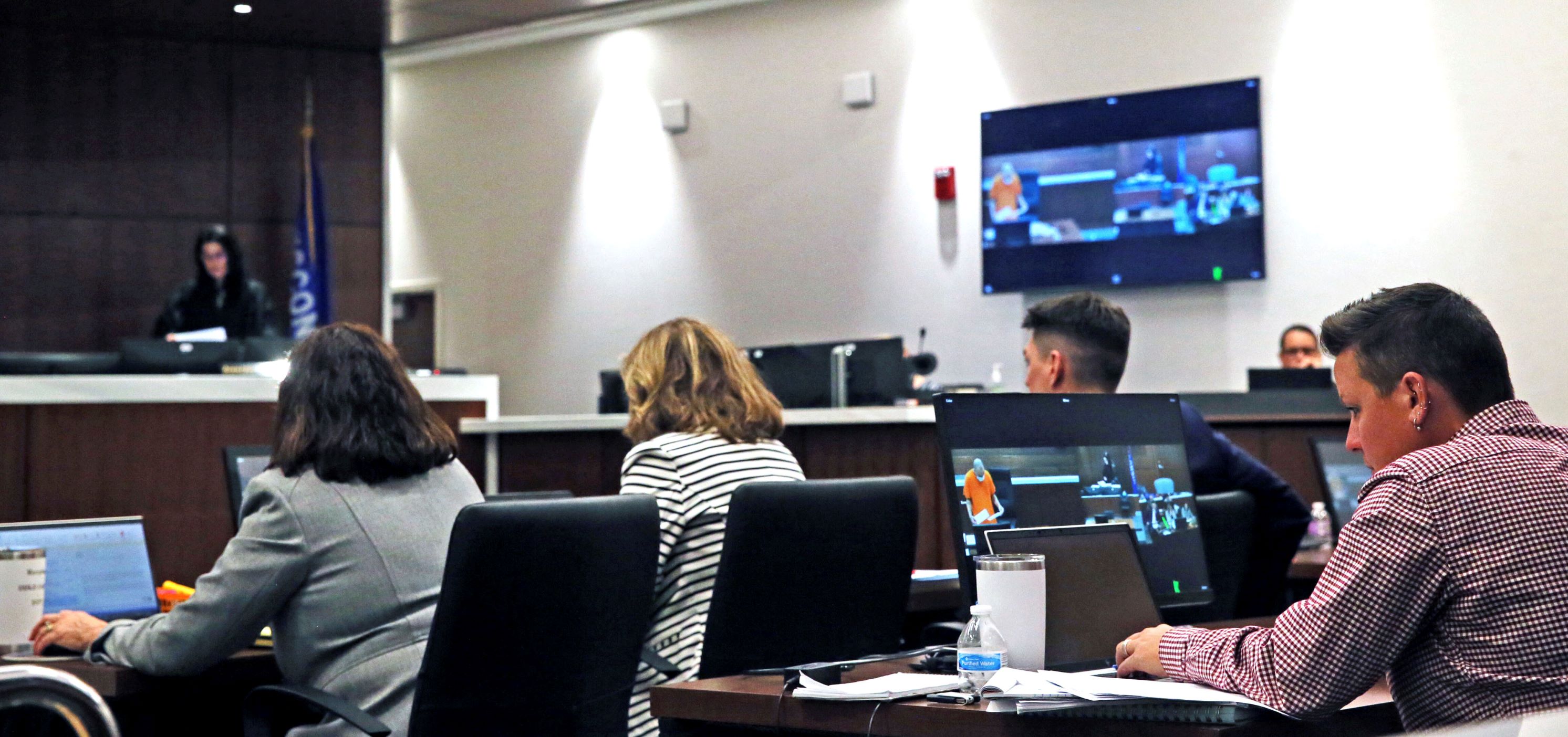 The state prosecution team listens