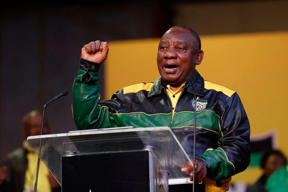 South Africa's President Cyril Ramaphosa gestures as he addresses Africa National Congress (ANC) delegates at the National Recreation Center in Johannesburg on July 29, 2022, during the first day of the party's National Policy Conference. (Phill Magakoe/AFP via Getty Images)