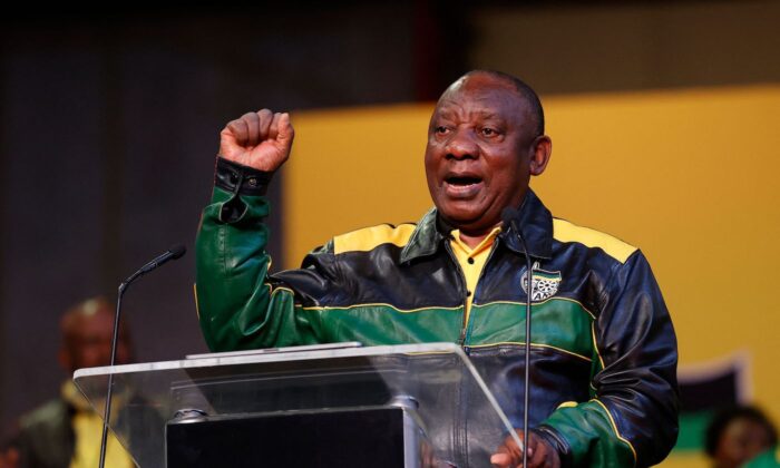 South Africa's President Cyril Ramaphosa gestures as he addresses Africa National Congress (ANC) delegates at the National Recreation Center in Johannesburg on July 29, 2022, during the first day of the party's National Policy Conference. (Phill Magakoe/AFP via Getty Images)