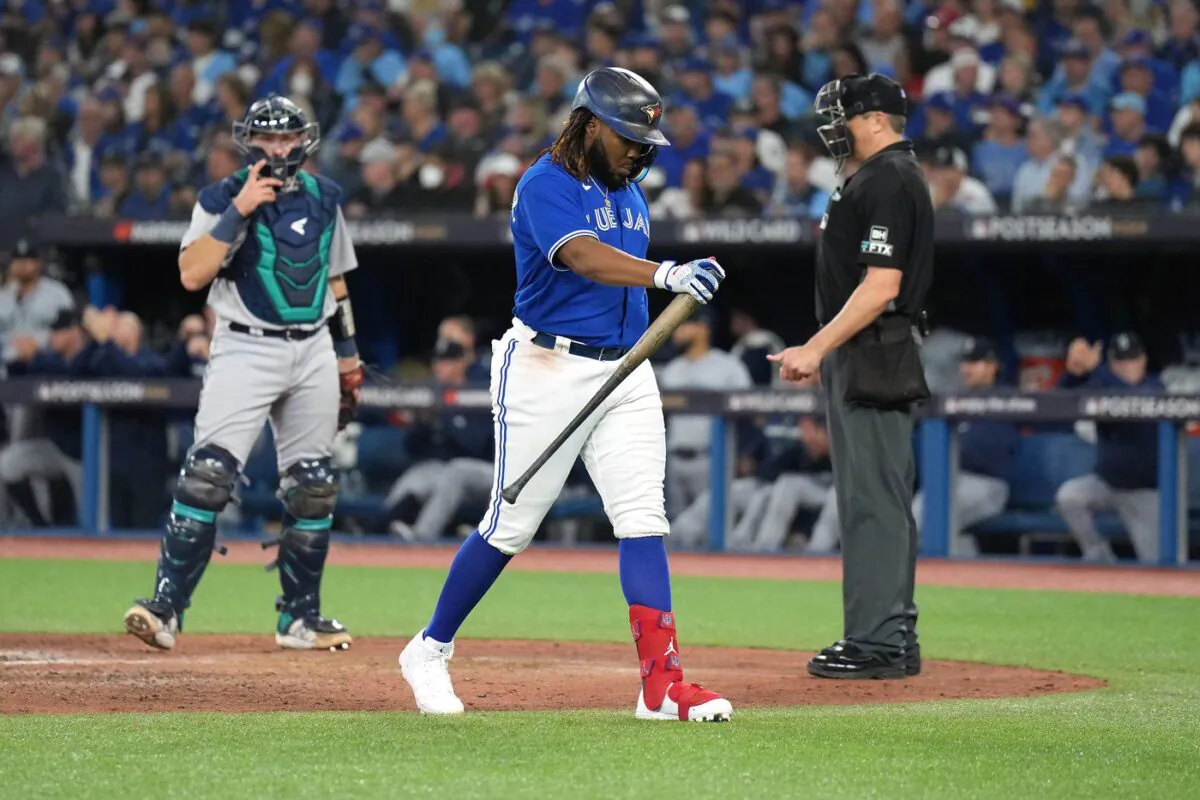 Toronto Blue Jays first baseman Vladimir Guerrero Jr. (27) walks back to the dugout after striking out against the Seattle Mariners during sixth inning American League wild card MLB post-season baseball action in Toronto on Oct. 7, 2022. (The Canadian Press/Nathan Denette)