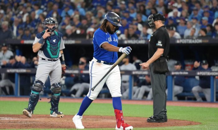 Toronto Blue Jays first baseman Vladimir Guerrero Jr., 27, returned to the dugout after striking out the Seattle Mariners during American League Wild Card MLB postseason baseball action on Oct. 7, 2022 in Toronto. (The Canadian Press / Nathan Dennett)