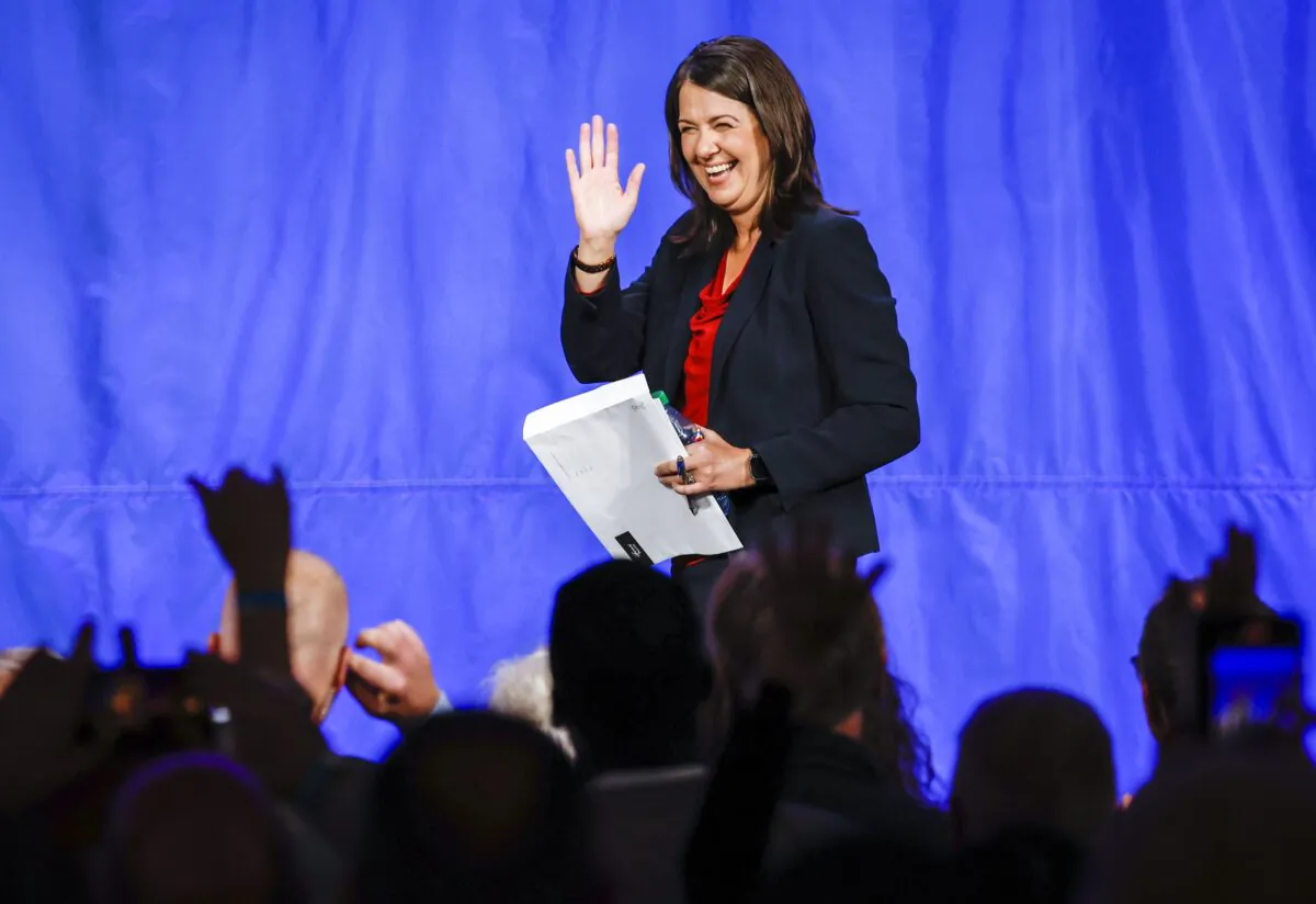 Danielle Smith waves to supporters after being chosen as the new leader of the United Conservative Party and next Alberta premier, in Calgary on Oct. 6, 2022. (The Canadian Press/Jeff McIntosh)