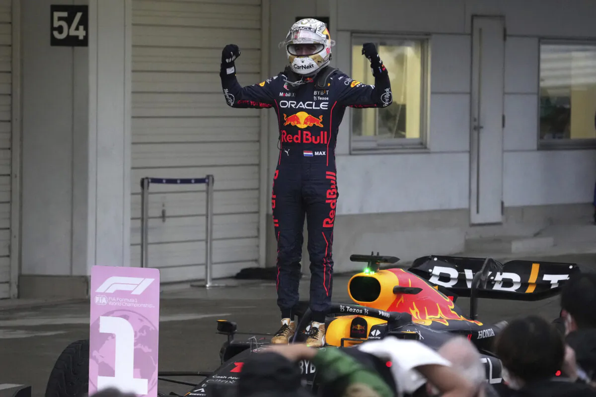 Red Bull driver Max Verstappen of the Netherlands celebrates after winning the Japanese Formula One Grand Prix at the Suzuka Circuit in Suzuka, central Japan, on Oct. 9, 2022. (Toru Hanai/AP Photo)