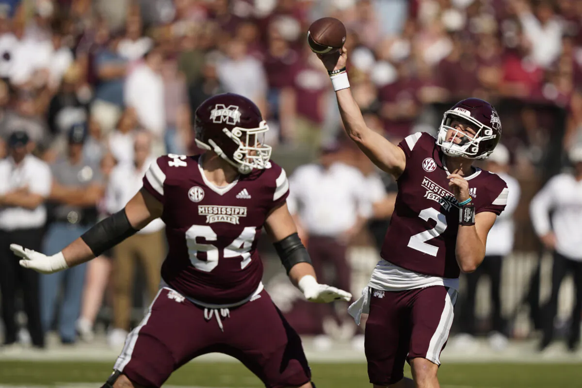 Mississippi State quarterback Will Rogers (2) throws behind the block of offensive lineman Steven Losoya III (64) during the first half of an NCAA college football game  against Arkansas in Starkville, Miss., on Oct. 8, 2022. (Rogelio V. Solis/AP Photo)