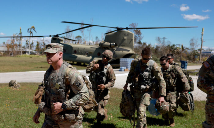 Members of Florida Army National Guard arrive on Pine Island, Fla., on Oct. 2, 2022. (Joe Raedle/Getty Images)