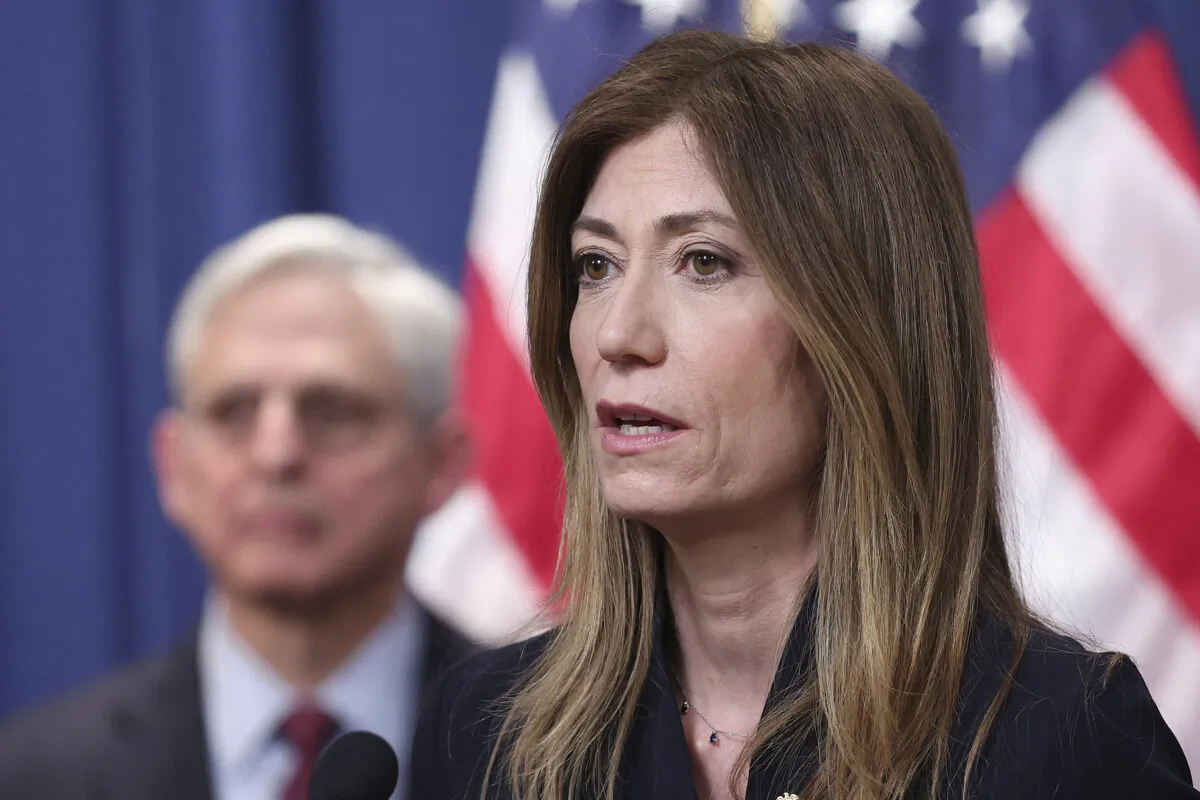 Anne Milgram, administrator of the U.S. Drug Enforcement Administration, accompanied by U.S. Attorney General Merrick Garland, answers questions about the extradition and unsealing of an indictment charging former Honduran President Juan Orlando Hernandez, at the Department of Justice in Washington, on April 21, 2022. (Win McNamee/POOL/AFP via Getty Images)