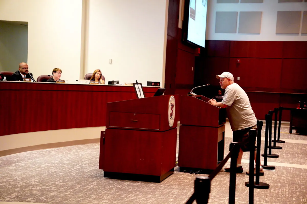 Scott Smith, the father of the May 2021 rape victim at Stone Bridge High School in Loudoun County, speaks to Loudoun County School Board members in Ashburn, Va., on Sept. 13, 2022. (Terri Wu/The Epoch Times)