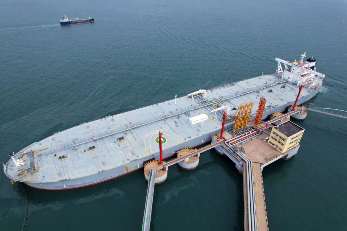An oil tanker unloads imported crude oil at Qingdao port in China's eastern Shandong province on May 9, 2022. (STR/AFP via Getty Images)