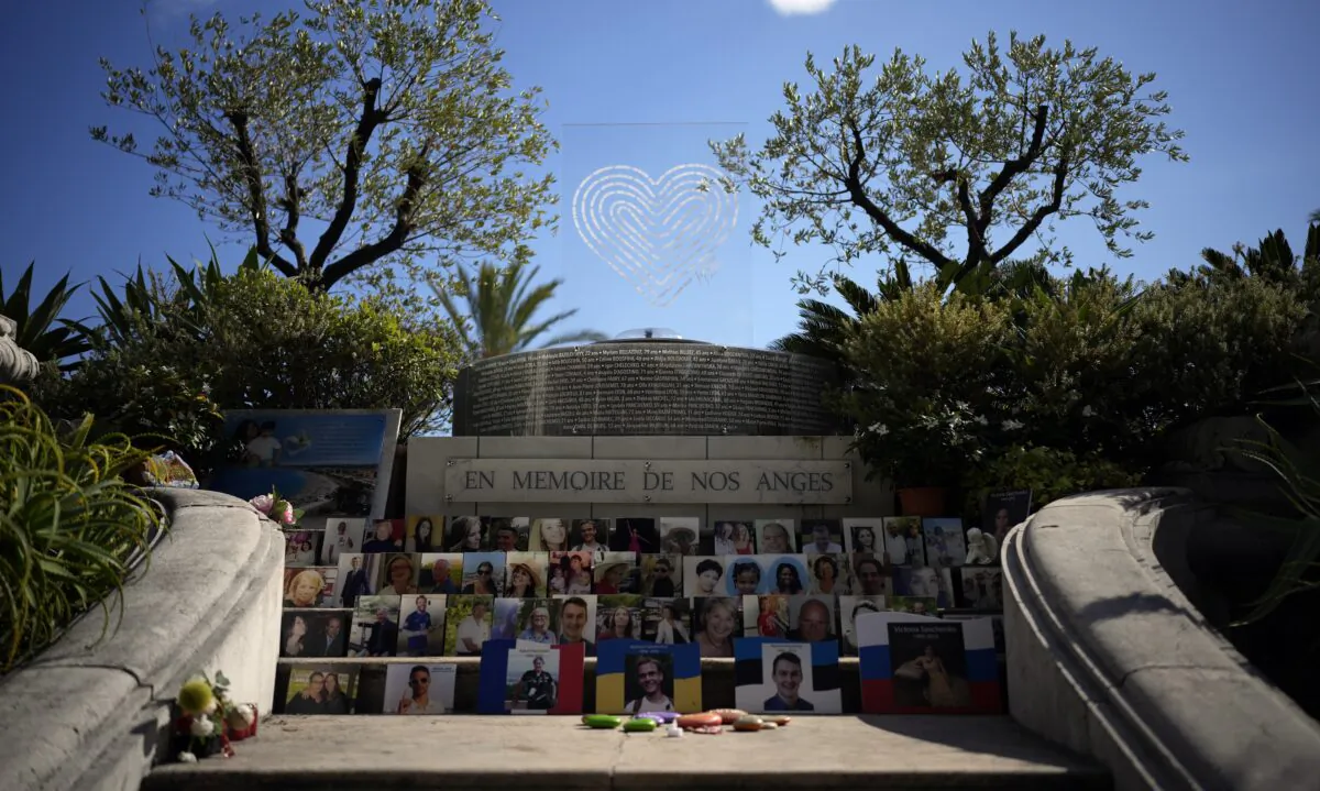 "In Memory of our Angels" is engraved on the memorial for the victims of the attack of July 14, 2016 with pictures and names of the victims along Nice's Promenade des Anglais, to commemorate the 2016 terror attack, in Nice, South of France, on Sept. 4, 2022. (Daniel Cole/AP Photo)