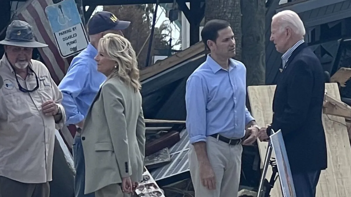 Florida Sen. Marco Rubio (R-Fla.) meets with President Joe Biden in Fort Myers Beach, Fla., with Sen. Rick Scott (R-Fla.), partially obscured by First Lady Jill Biden, looking on, on Oct. 5, 2022. (Courtesy Marco Rubio US Senate)