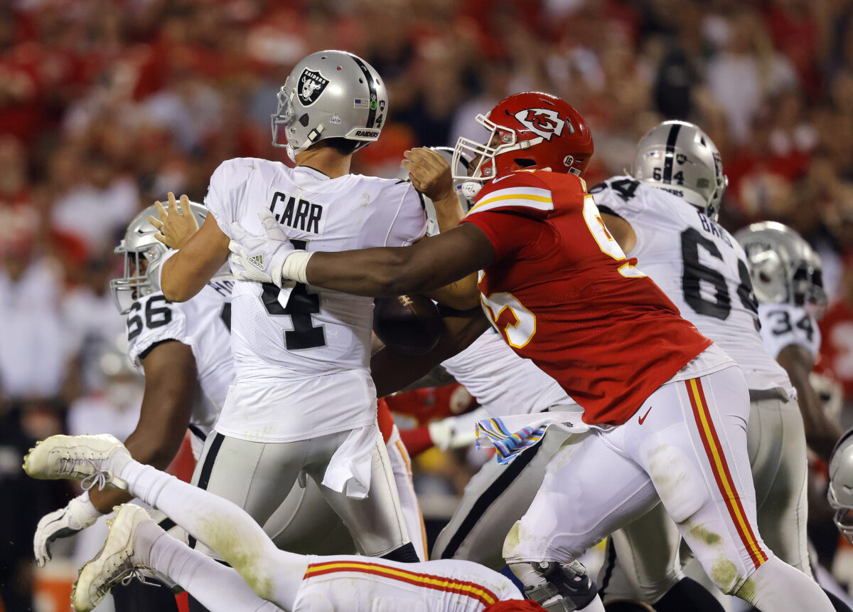 Chiefs hold on for wild victory over rival Raiders