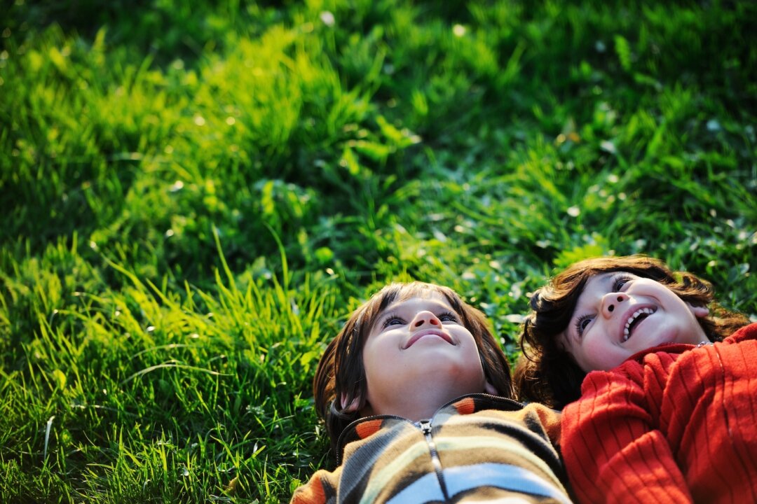Encourage your children's natural sense of curiosity by taking them out in nature where they can explore, and get away from devices. (ESB Professional/Shutterstock)